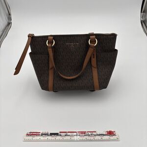 Michael Kors Solomon logo brown gold accent